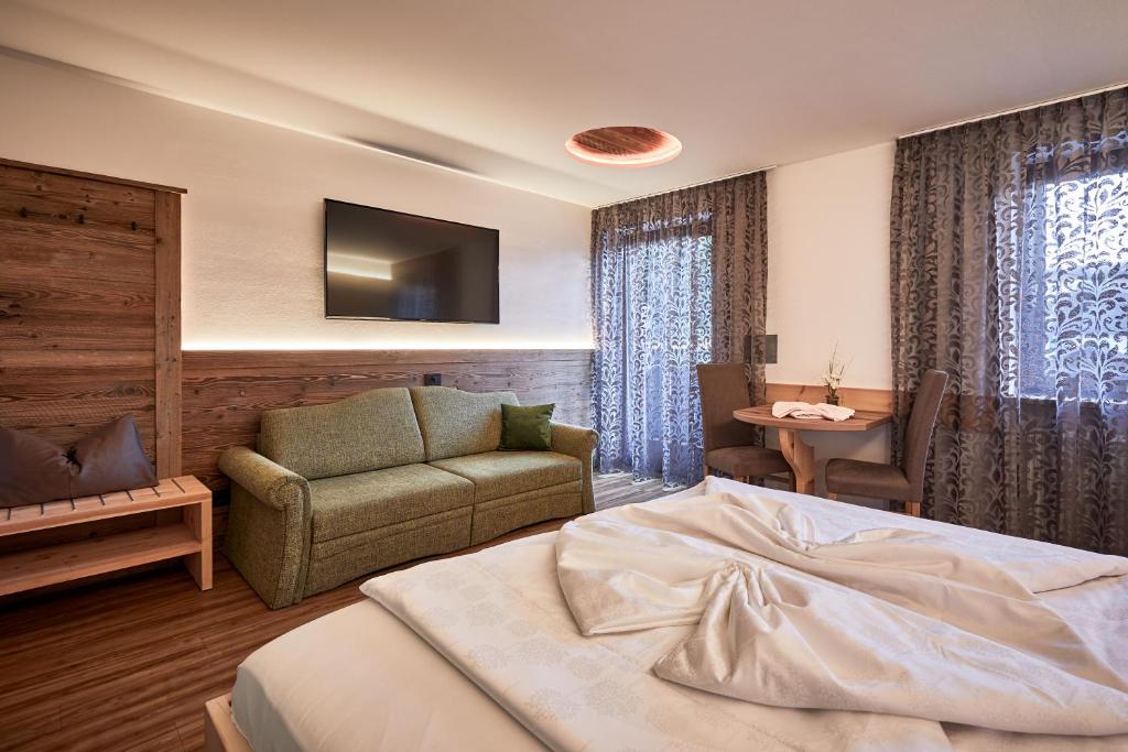Postel nebo postele na pokoji v ubytování Hotel Garni Savoy - new opening