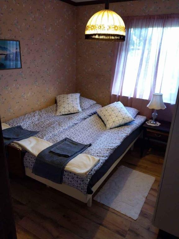 Postel nebo postele na pokoji v ubytování Villa Lovisa