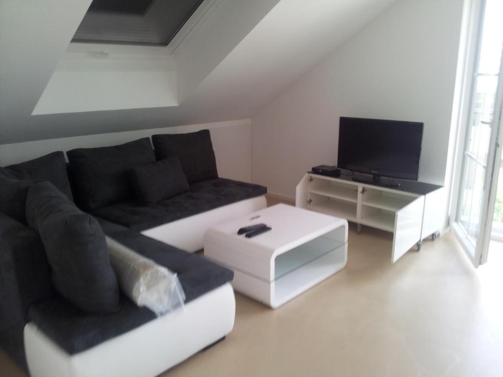 TV a/nebo společenská místnost v ubytování Hotel Kohlpeter