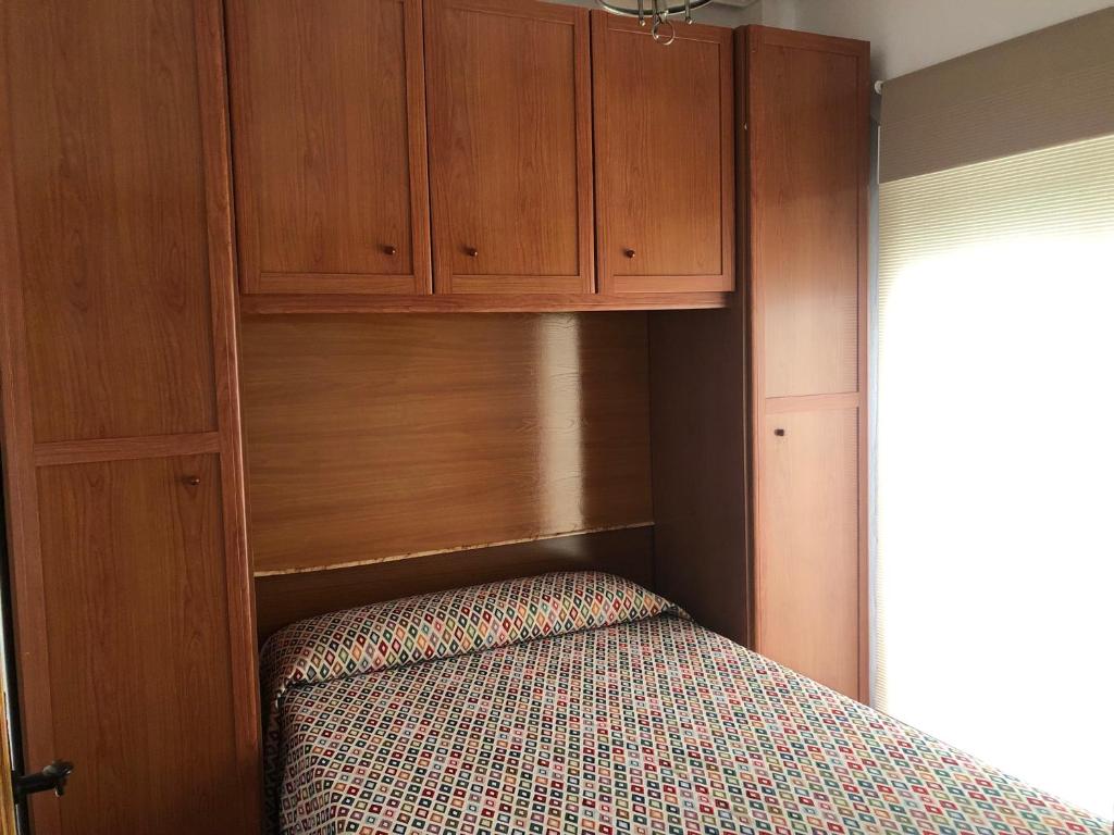 A bed or beds in a room at Apartamento Triana l Bolonia, Tarifa