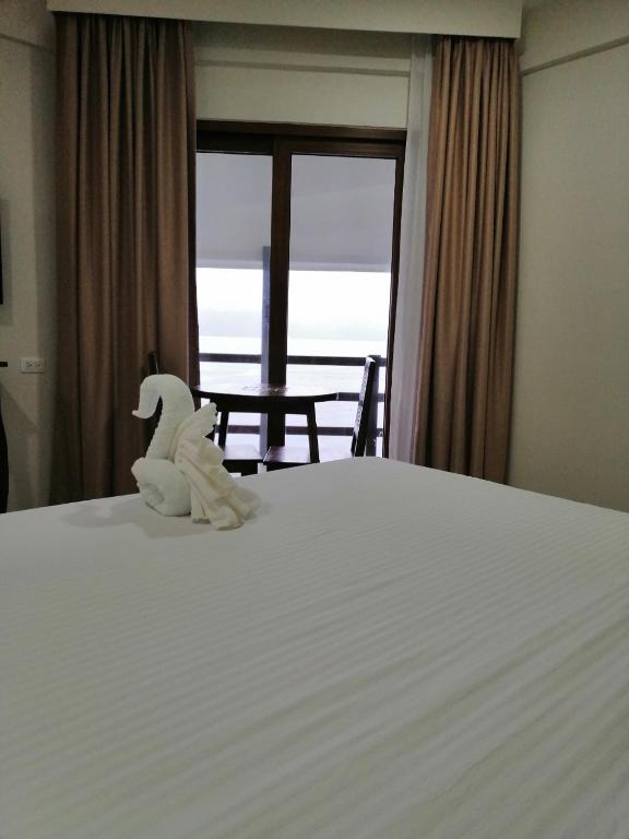 Postel nebo postele na pokoji v ubytování Nirvana Resort Puerto Galera