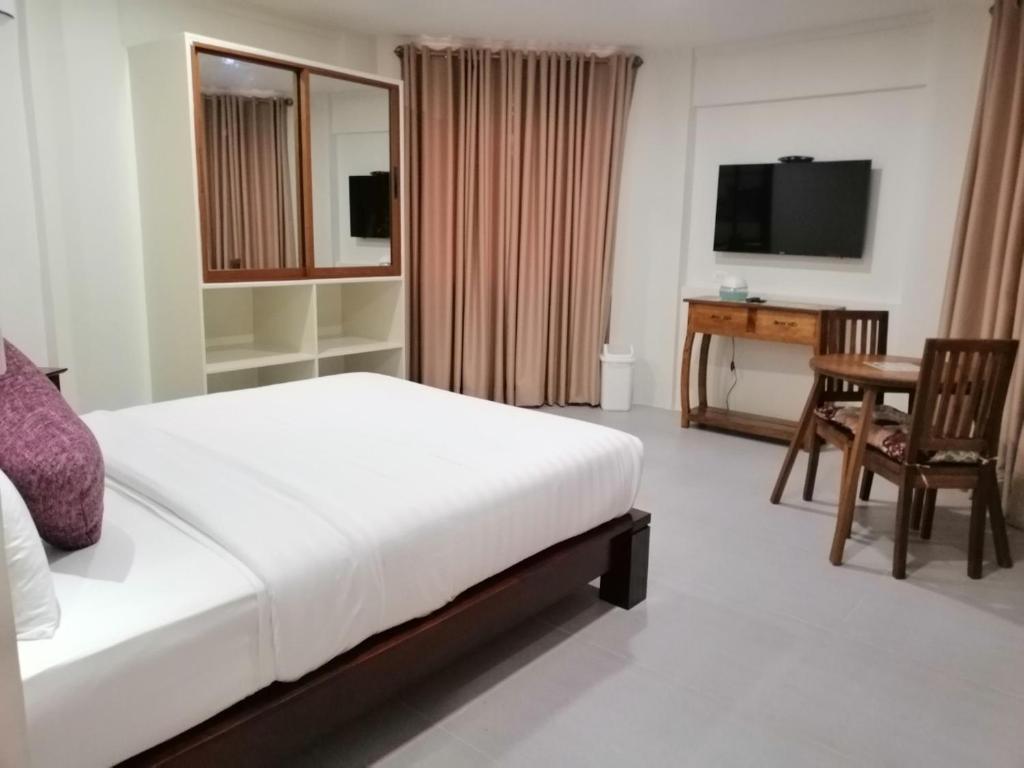 Postel nebo postele na pokoji v ubytování Nirvana Resort Puerto Galera