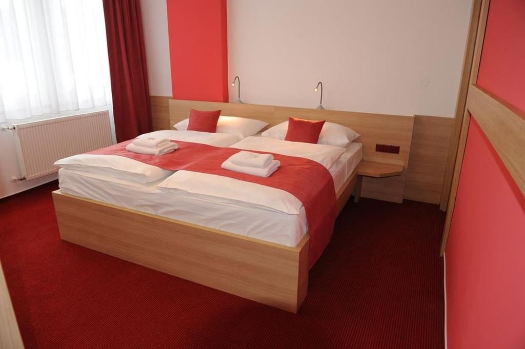 Postel nebo postele na pokoji v ubytování Hotel Uno
