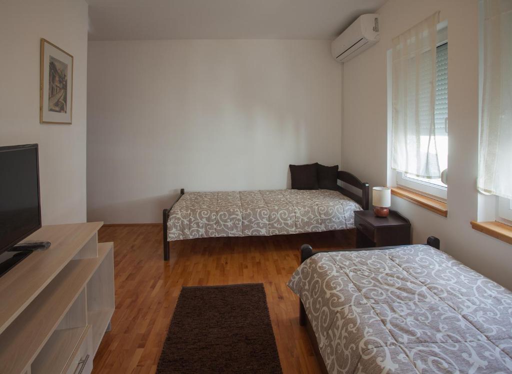 Postel nebo postele na pokoji v ubytování Guesthouse Rota
