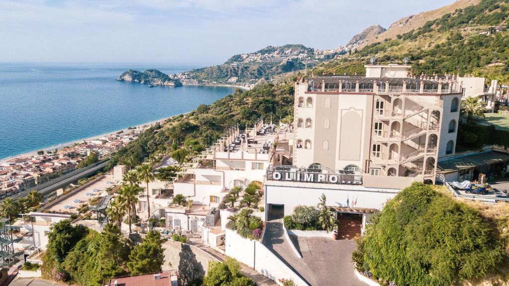 an aerial view of a town next to the ocean at Hotel Olimpo le Terrazze in Letojanni