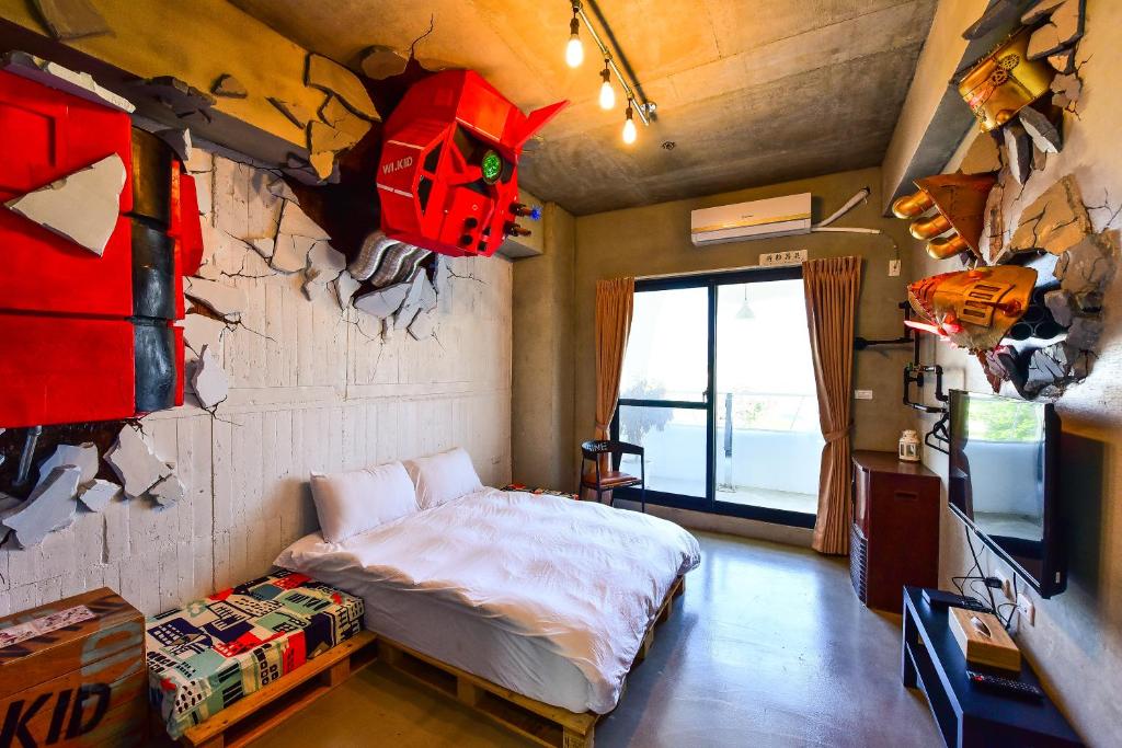 Krevet ili kreveti u jedinici u okviru objekta Anping Wikid Design Hotel