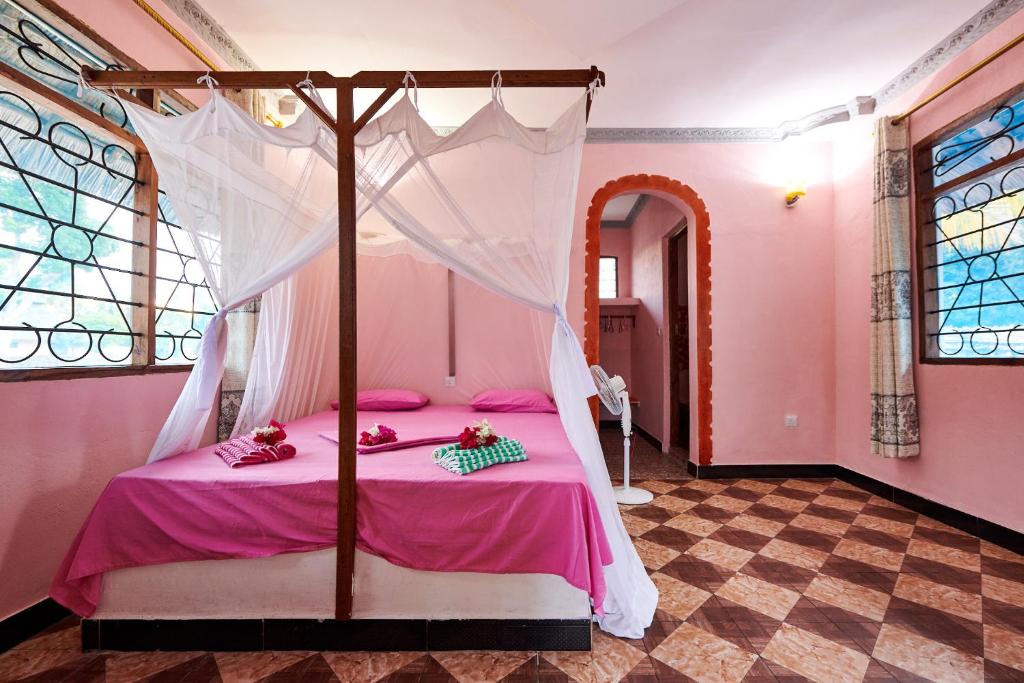 Postel nebo postele na pokoji v ubytování Meremeta Lodge