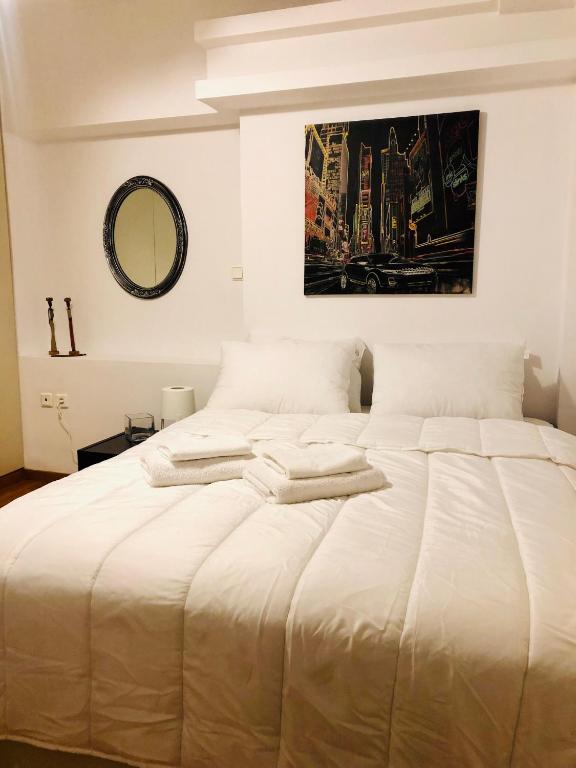 Posteľ alebo postele v izbe v ubytovaní Elenis Athens Apartment