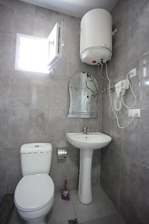 Koupelna v ubytování Hotel Botanica