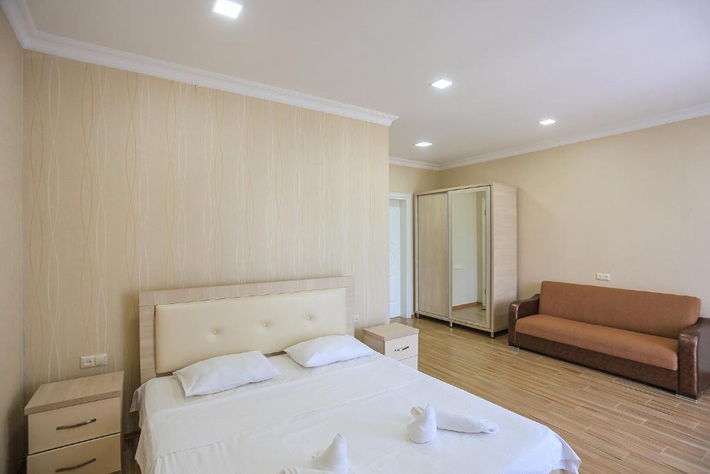 Postel nebo postele na pokoji v ubytování Hotel Botanica