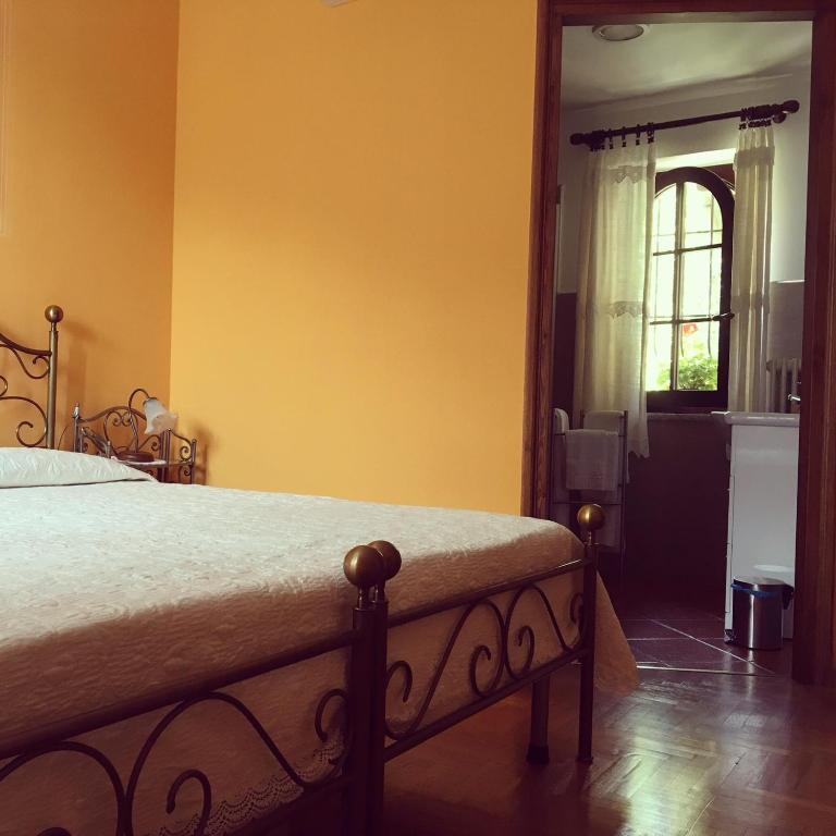 Postel nebo postele na pokoji v ubytování B&B Azalea