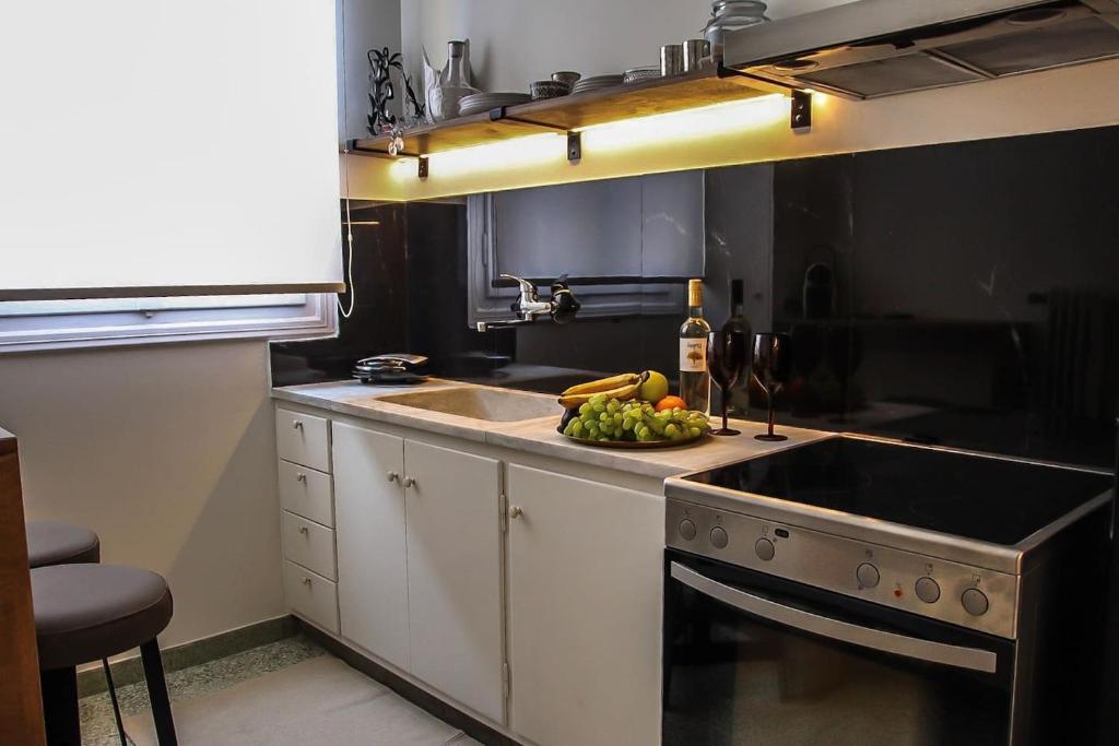 Kuchyňa alebo kuchynka v ubytovaní API Projects Athens - Cartier Apartment