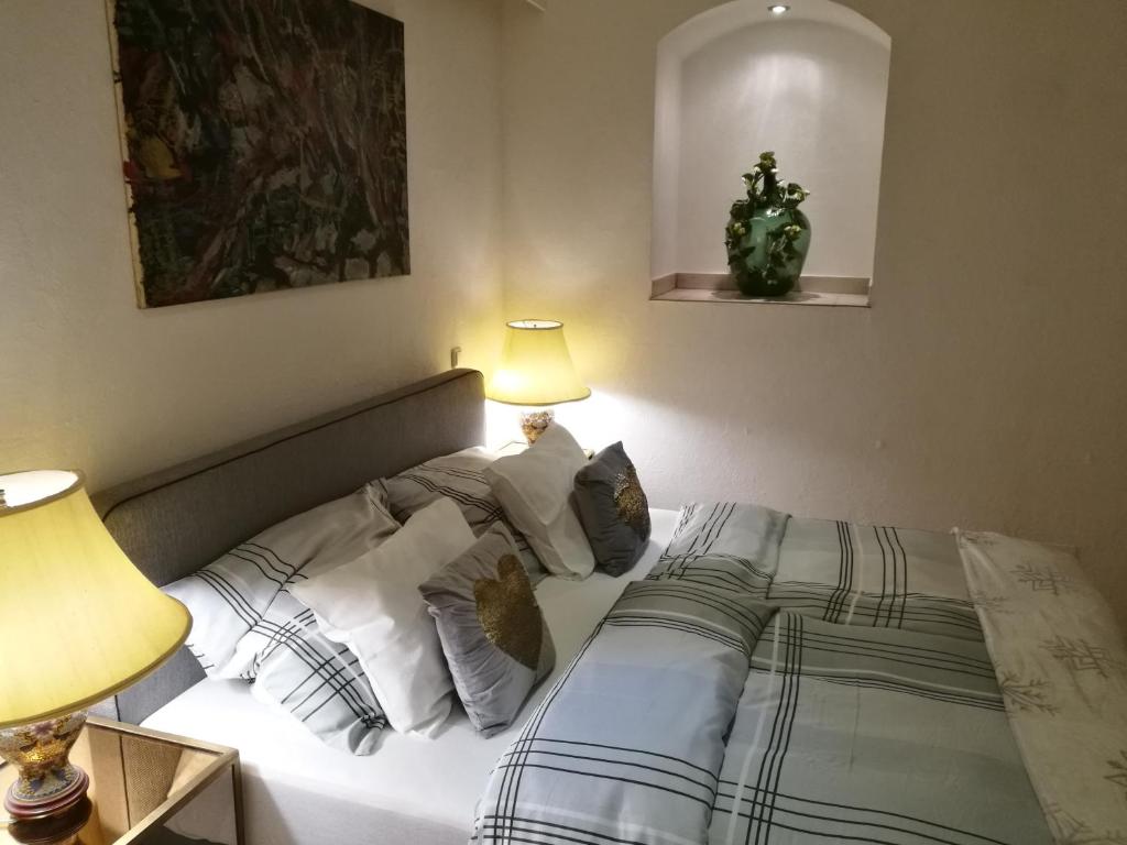 Postel nebo postele na pokoji v ubytování Gästezimmer & Apartment Mayrhofer