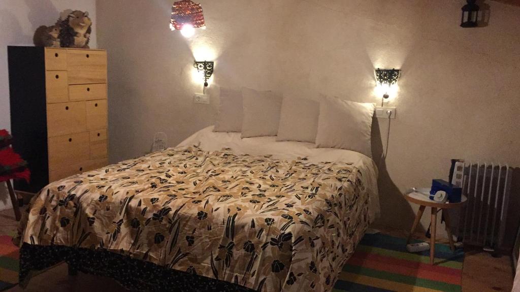 Postel nebo postele na pokoji v ubytování La Casa de La Duquesa