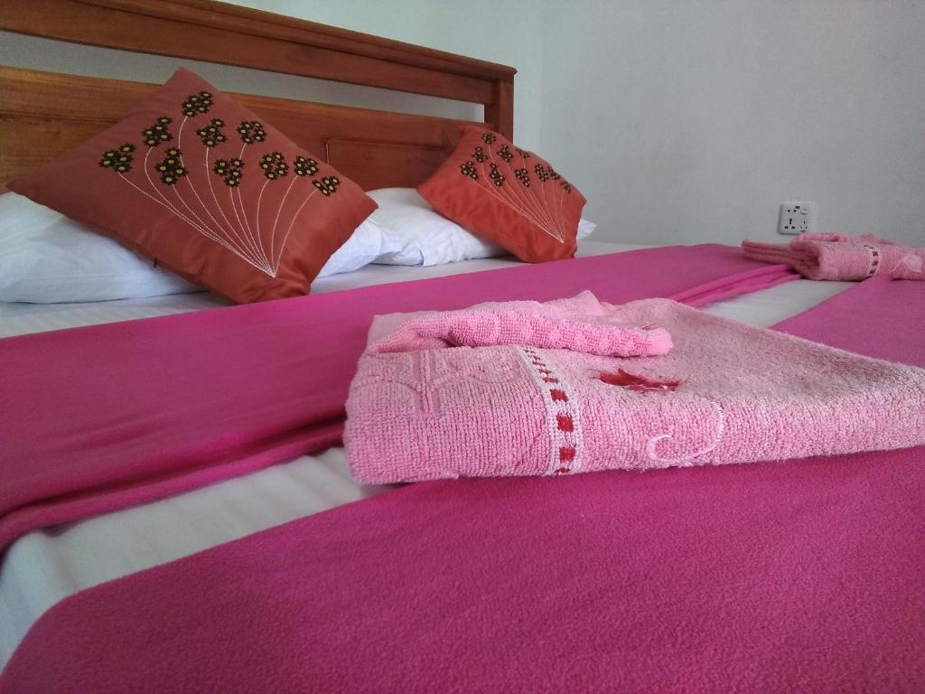 Postel nebo postele na pokoji v ubytování Opal Cottage Ella