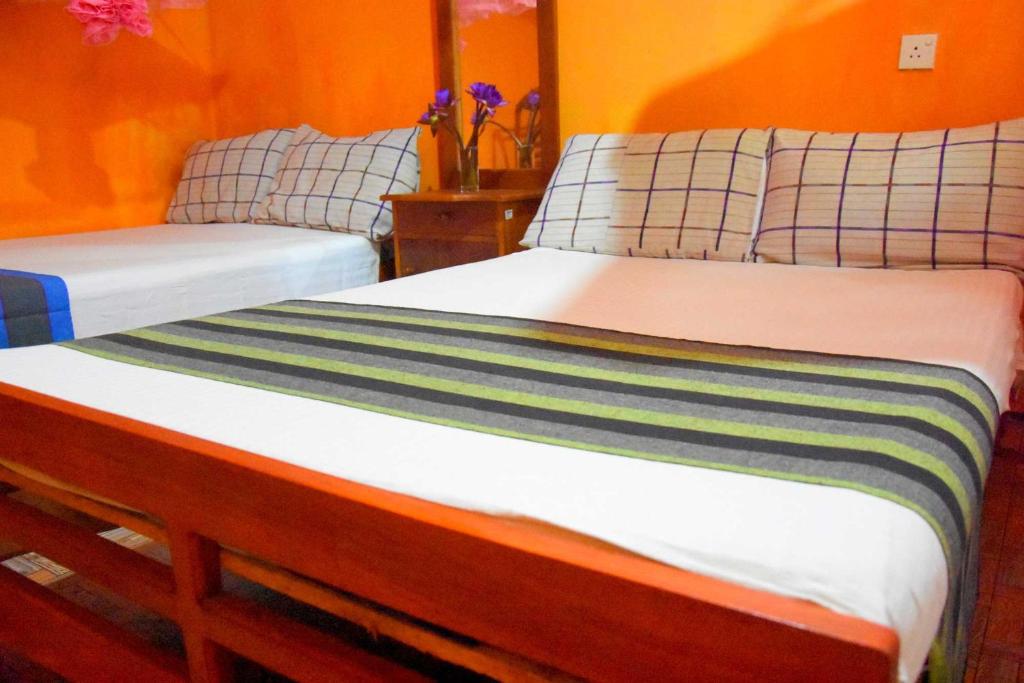 Postel nebo postele na pokoji v ubytování S P City Resort