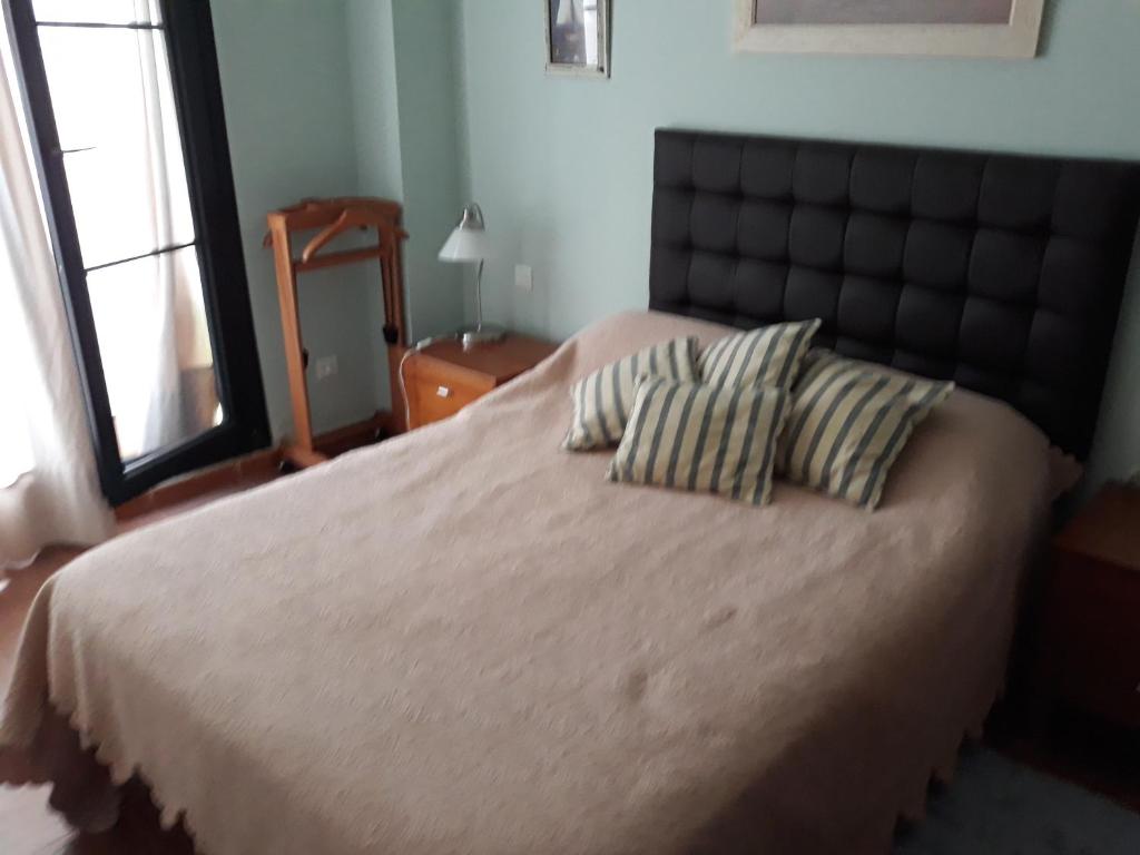 Postel nebo postele na pokoji v ubytování RINCON DE SARA