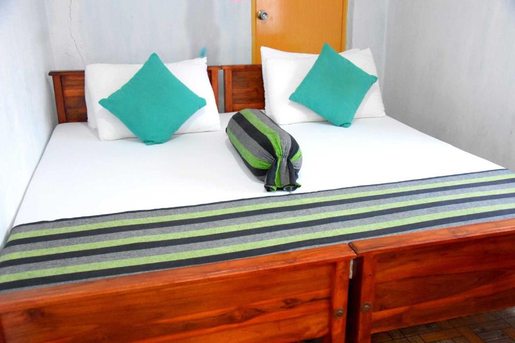 Postel nebo postele na pokoji v ubytování S P City Resort