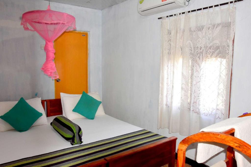 Postel nebo postele na pokoji v ubytování S P City Resort