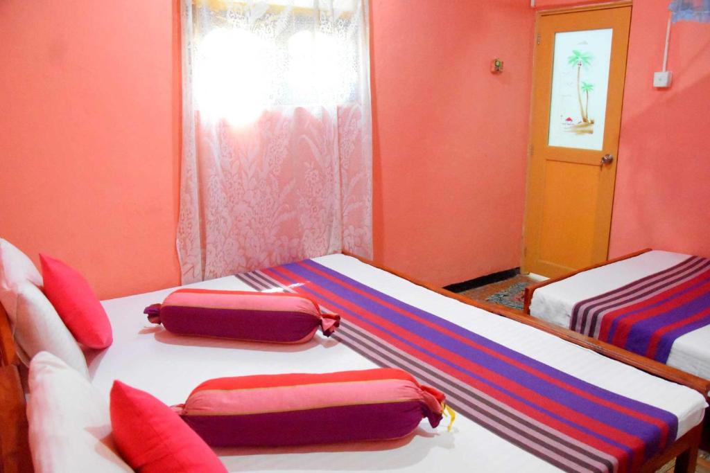 Postel nebo postele na pokoji v ubytování S P City Resort