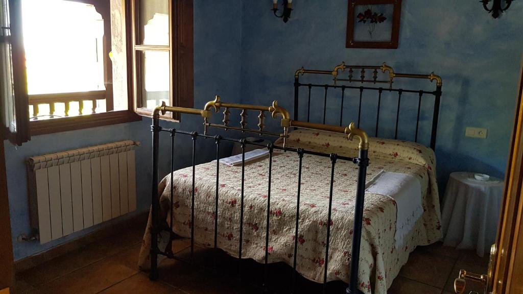 Postel nebo postele na pokoji v ubytování Casa rural el campu