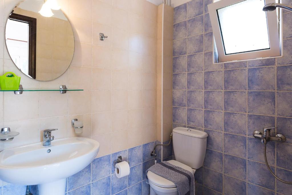 Kúpeľňa v ubytovaní Voukelari Rooms