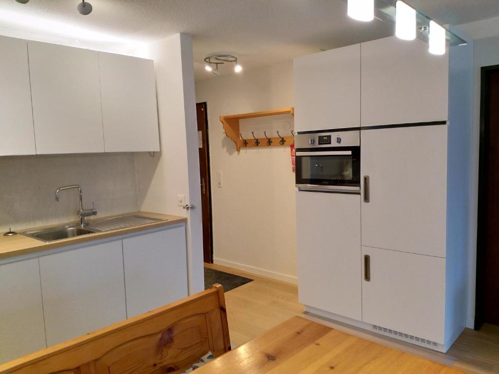 Kuchyň nebo kuchyňský kout v ubytování Schöne und Moderne Ferienwohnung