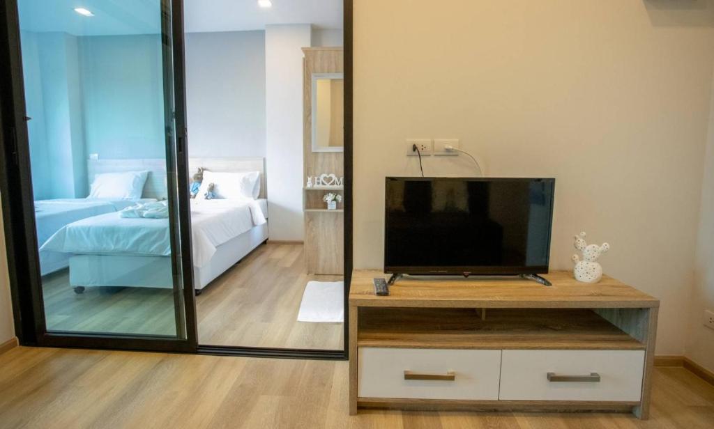 TV a/nebo společenská místnost v ubytování Casa Coco Hotel