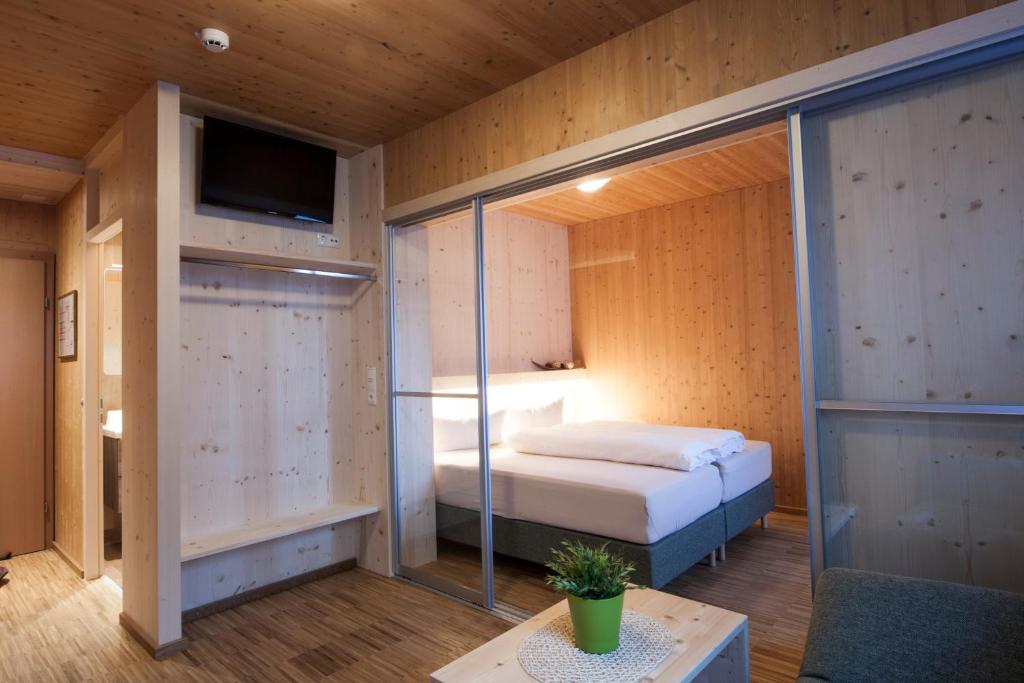 Postel nebo postele na pokoji v ubytování Hotel Tia Smart Natur