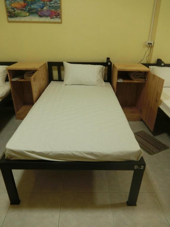 Postel nebo postele na pokoji v ubytování Inncome Hostel