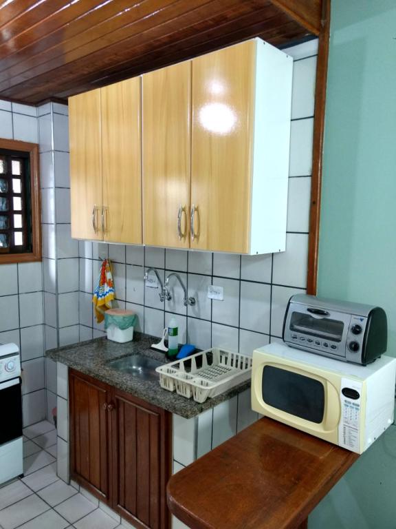  Casa em condomínio a 150 m da praia