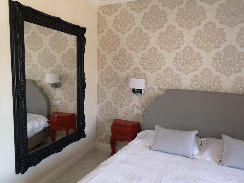 Postel nebo postele na pokoji v ubytování Hotel Altavilla Catanzaro