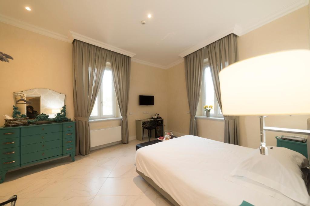 Postel nebo postele na pokoji v ubytování Hotel Altavilla Catanzaro