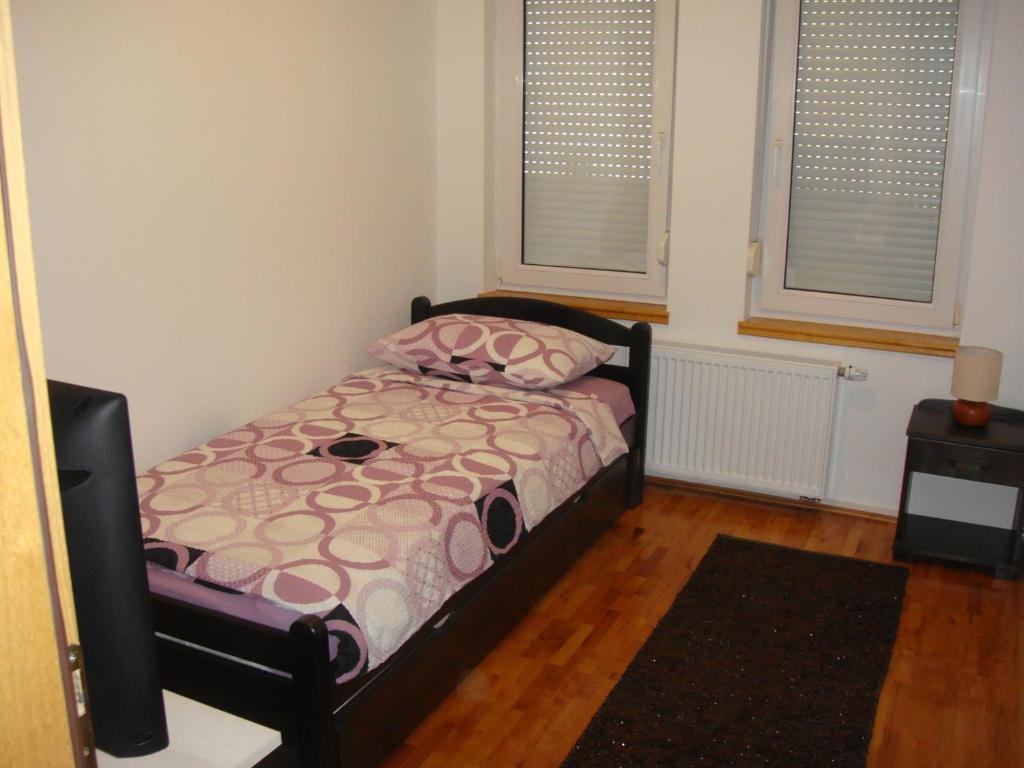 Postel nebo postele na pokoji v ubytování Guesthouse Rota