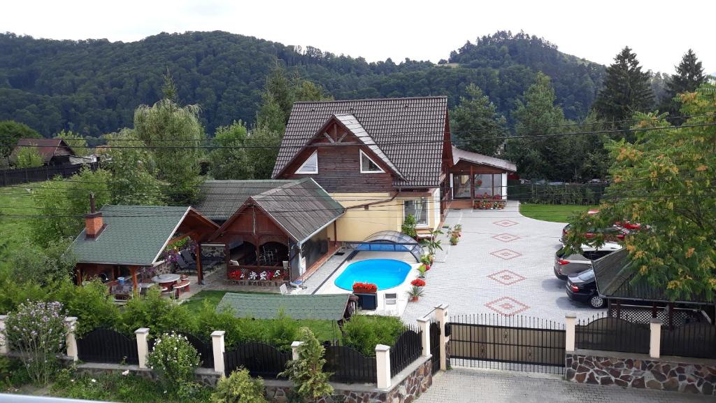 an aerial view of a house with a swimming pool at Vila Eszter in Sovata