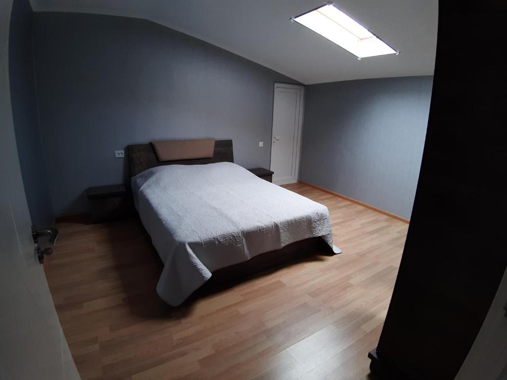 Postel nebo postele na pokoji v ubytování gogoli family hotel