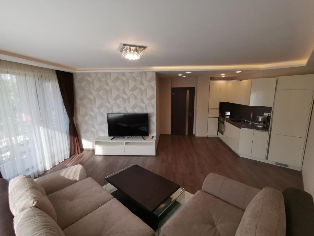 Kuchyň nebo kuchyňský kout v ubytování City Center Lux Apartment