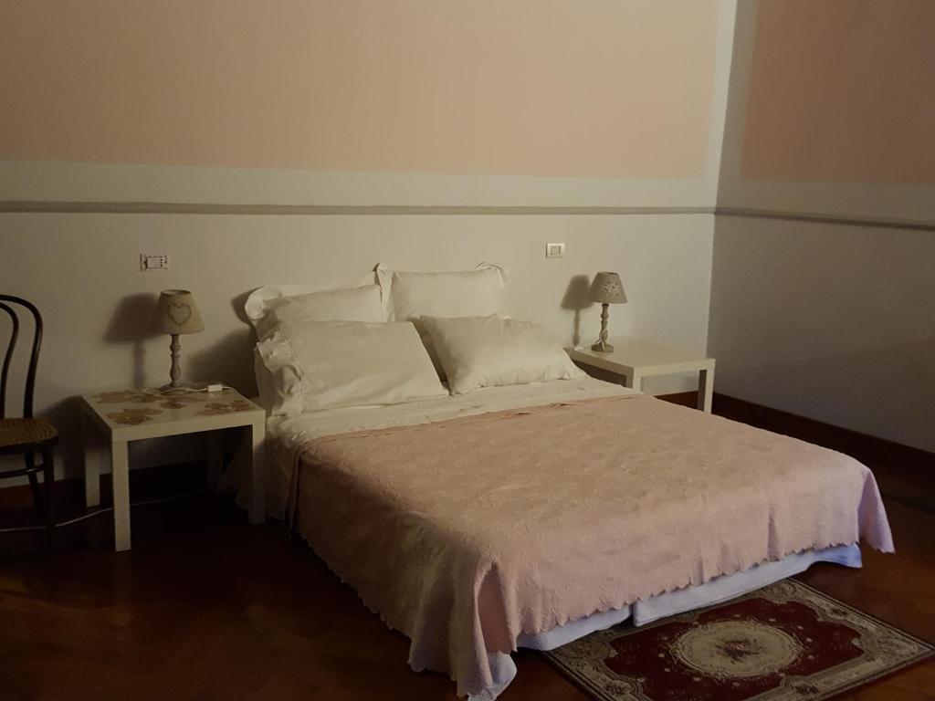 Postel nebo postele na pokoji v ubytování Villa Ghia