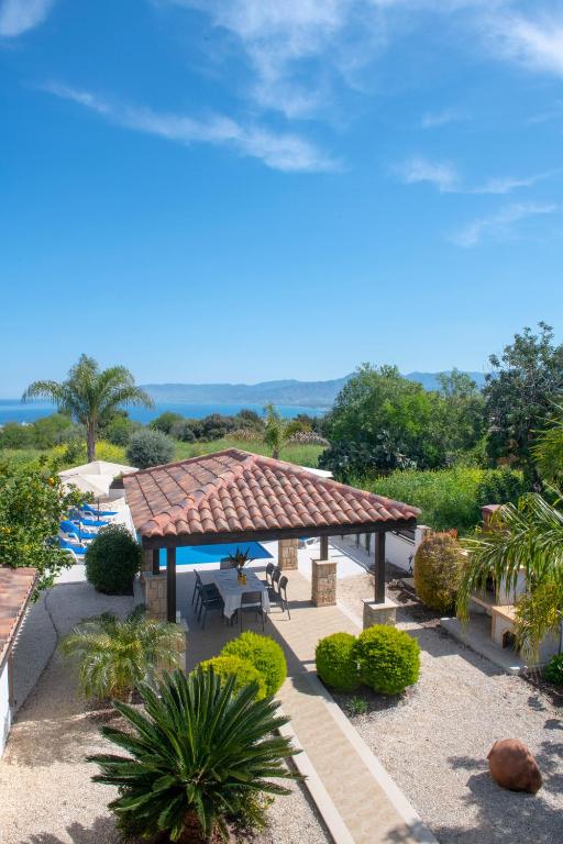 an aerial view of a resort with a gazebo at Kallizoni villa in Paphos