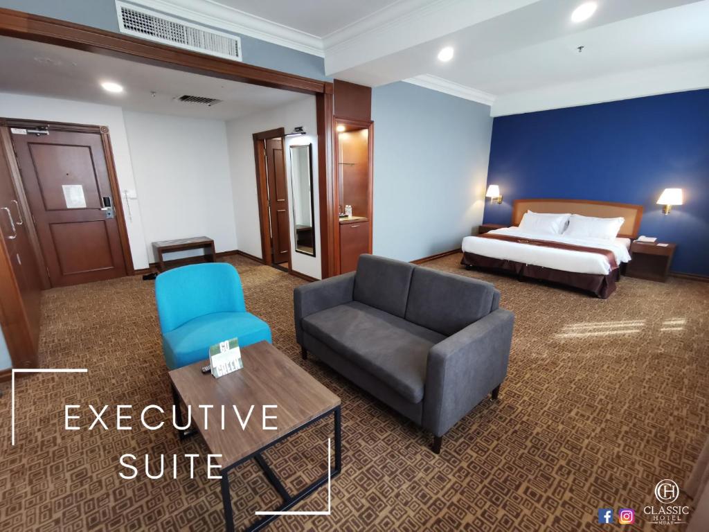 Postel nebo postele na pokoji v ubytování Classic Hotel