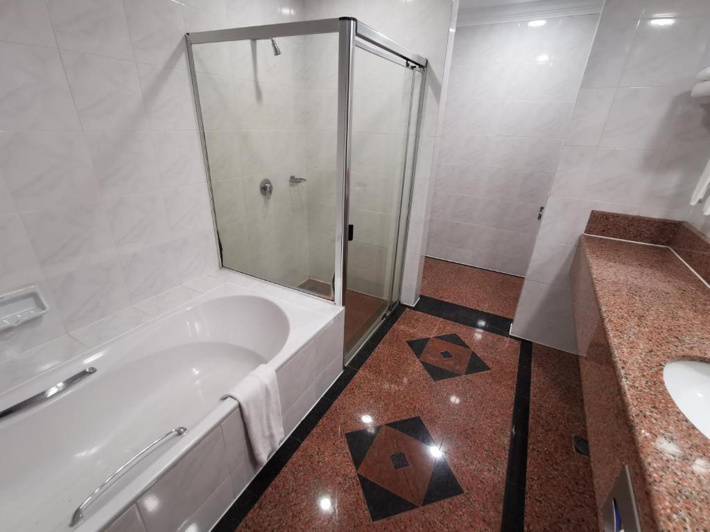 Koupelna v ubytování Classic Hotel