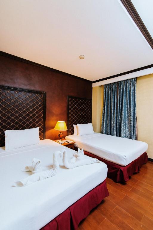 Postel nebo postele na pokoji v ubytování Hotel San Marco
