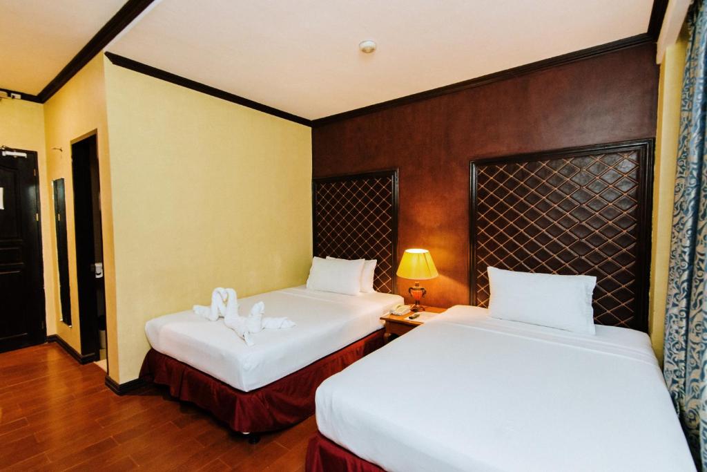 Postel nebo postele na pokoji v ubytování Hotel San Marco