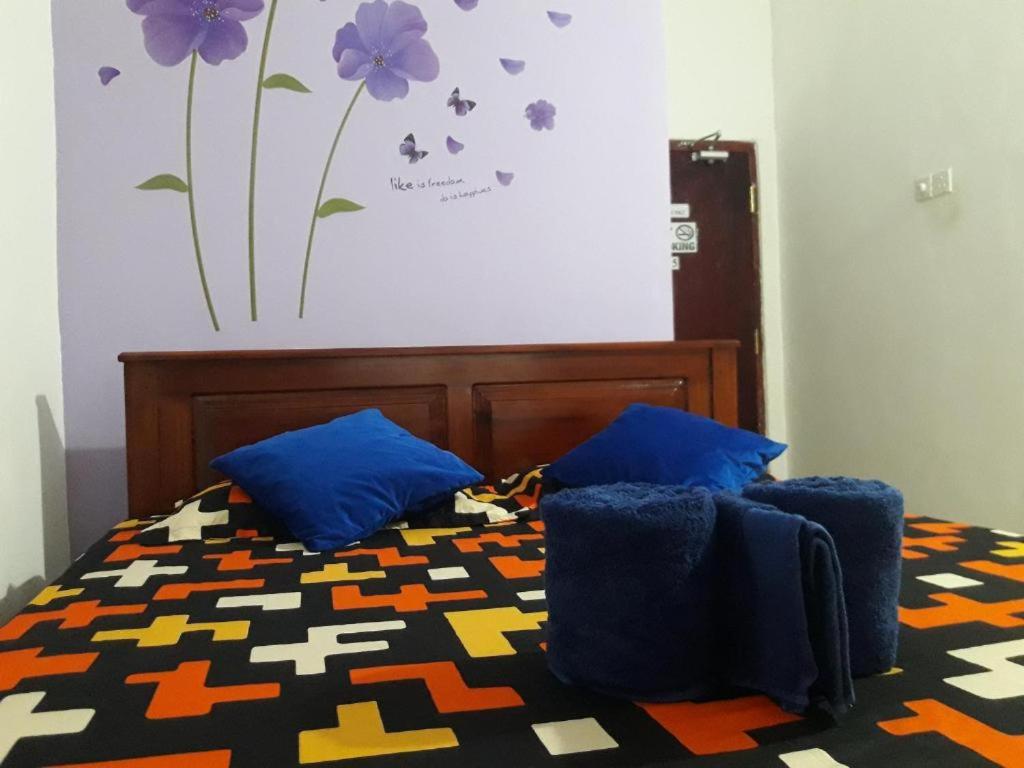 Postel nebo postele na pokoji v ubytování White Wall Hotel