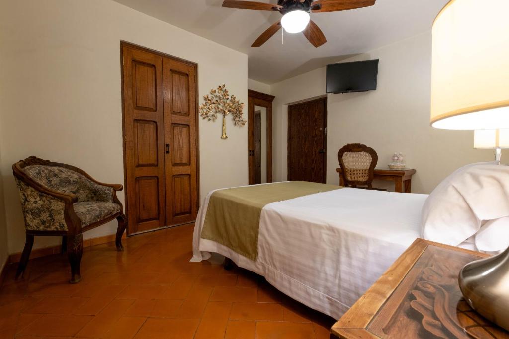 Postel nebo postele na pokoji v ubytování Hotel Layseca