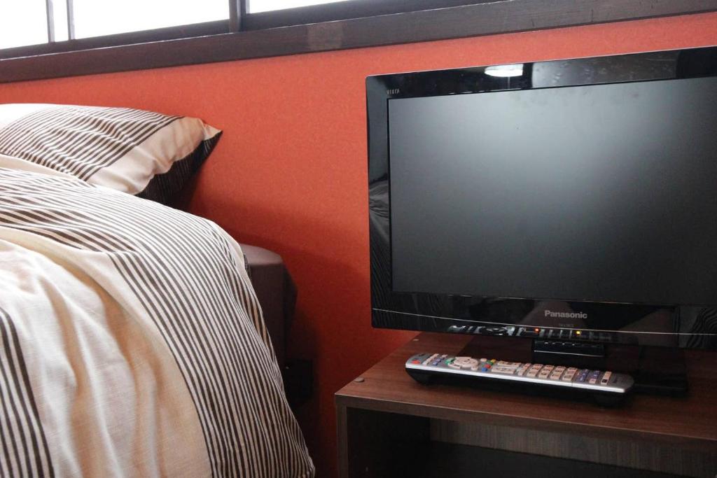 TV o dispositivi per l'intrattenimento presso 小さなお宿 乃むら