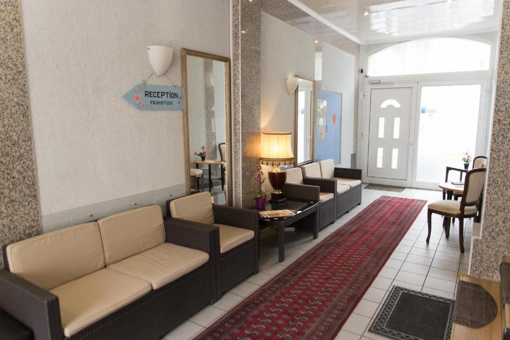 Posezení v ubytování Pension Central Nuernberg-Fuerth