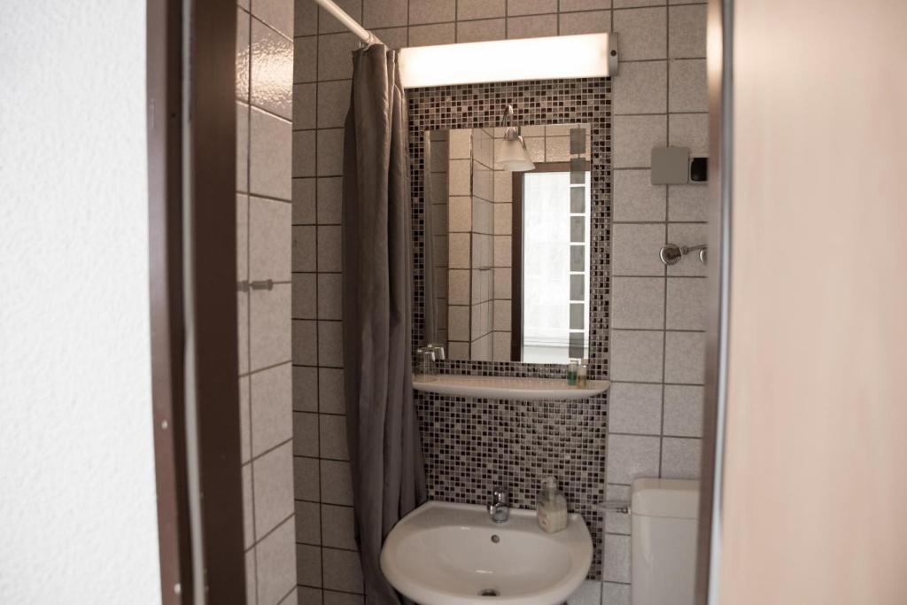 Koupelna v ubytování Pension Central Nuernberg-Fuerth