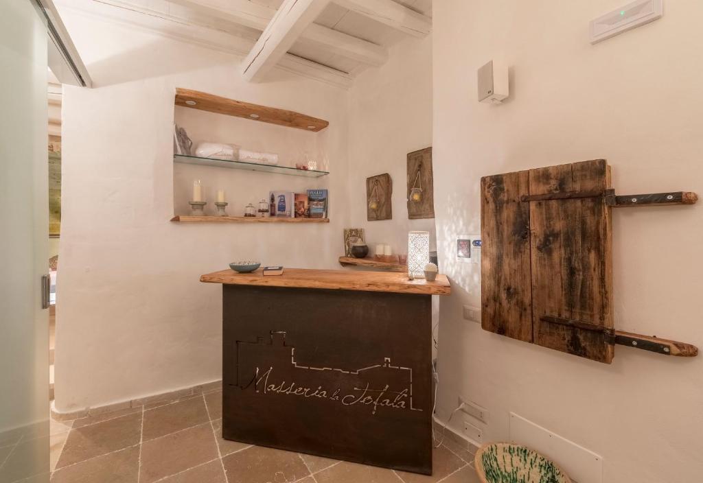 Kuchyň nebo kuchyňský kout v ubytování Masseria La Tofala benessere & SPA