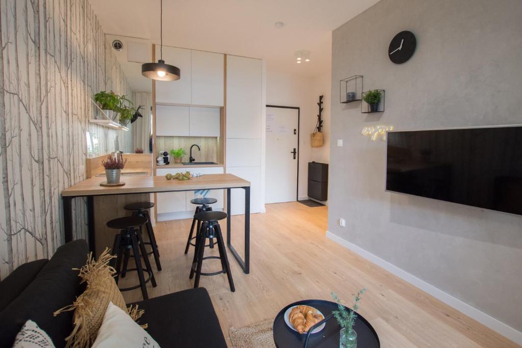 Kuchyň nebo kuchyňský kout v ubytování Rakowicka Apartment
